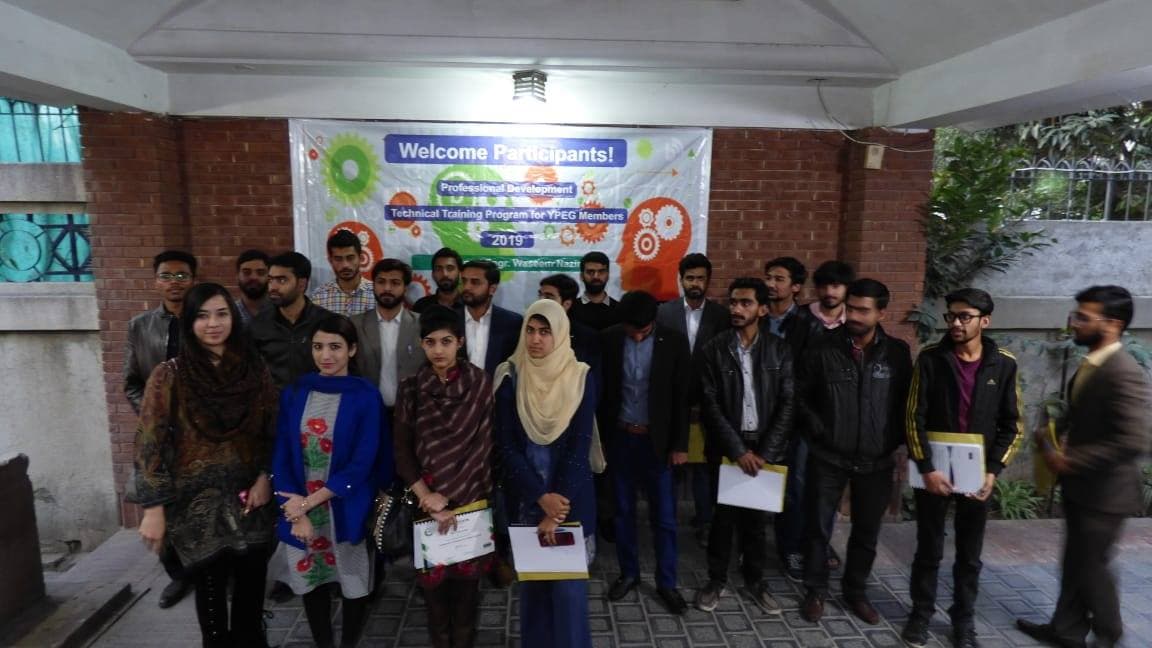 Group photo of training participants beneath a “Welcome Participants!” PEG banner at the Construction Management of Mega Projects training.